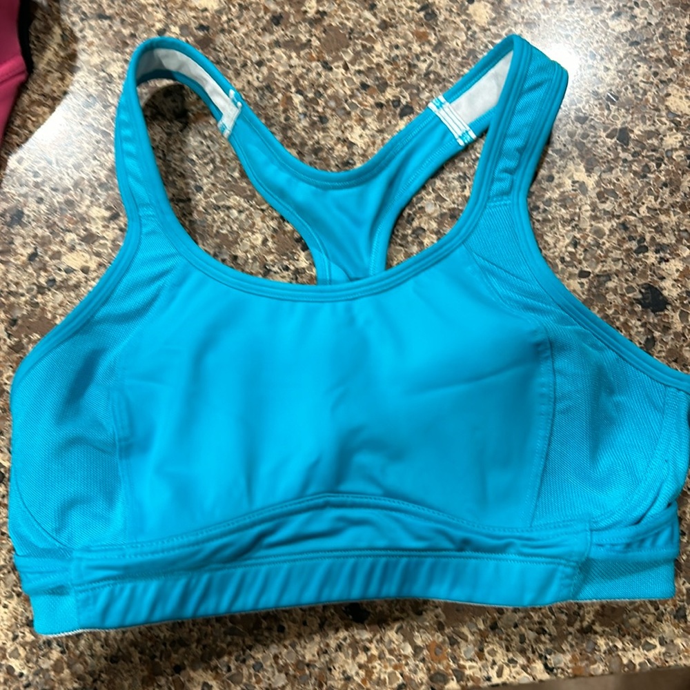 Champion teal sports bra size medium.